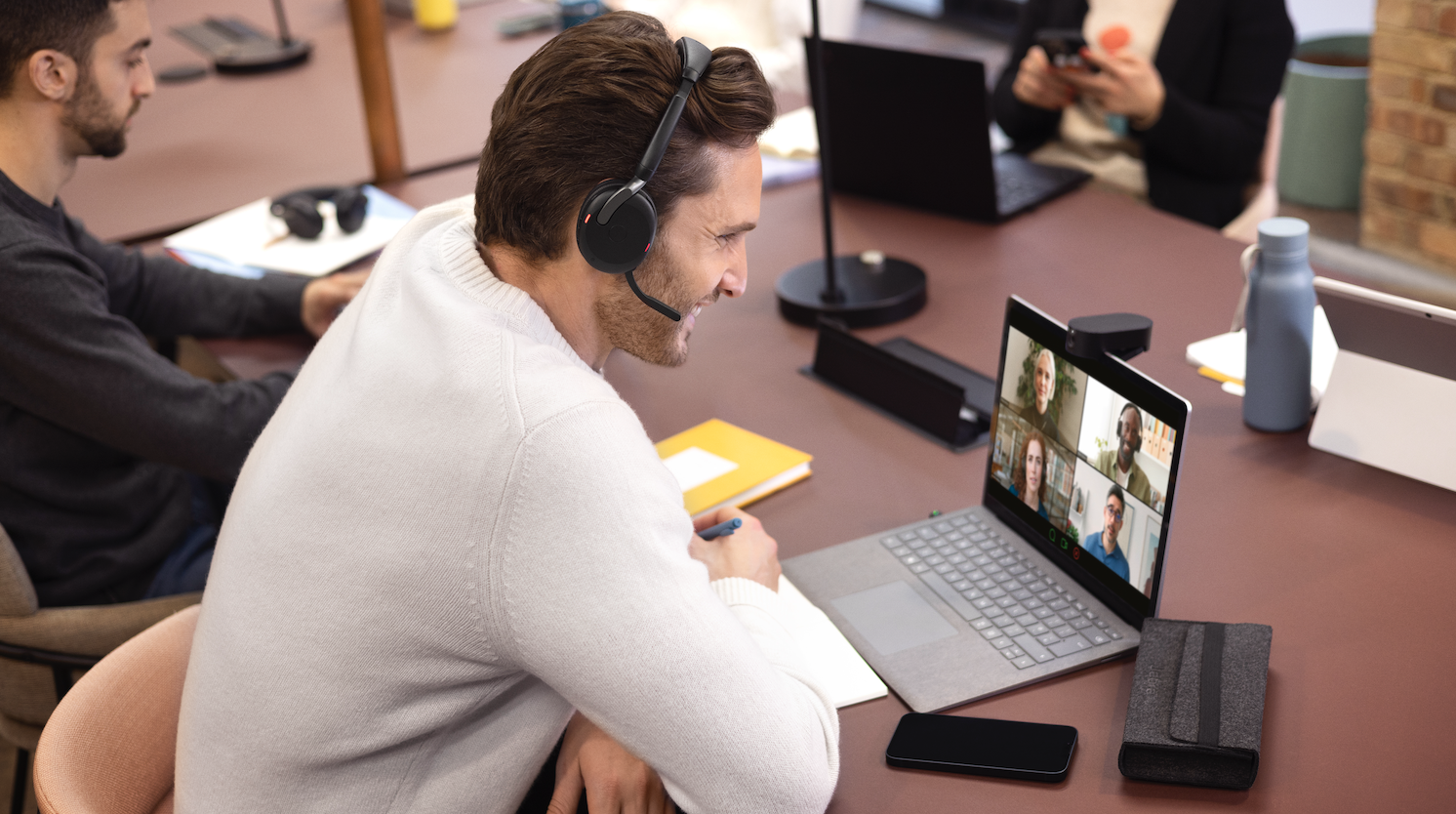 Jabra Evolve2 65 Flex Working At Desk